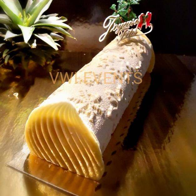 Présentation d'une bûche Pina Colada